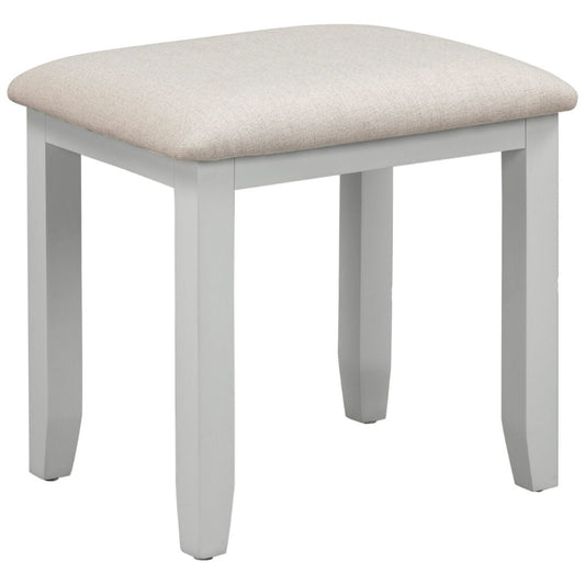 Grey stool with a beige cushioned top on a white background