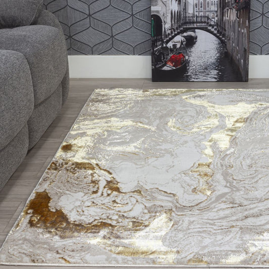 rug with gold and yellow swirl marble pattern