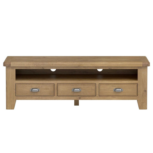 Wooden TV stand with three drawers on a white background