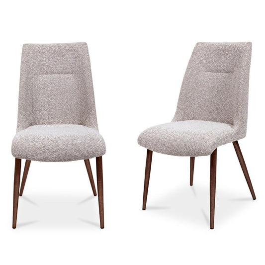 Two natural upholstered chairs with wooden legs on a white background