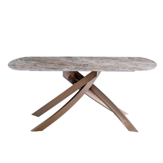 Marble-top dining table with brass legs on a white background