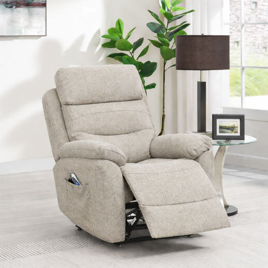 Beige recliner chair in a living room setting with a plant and table lamp.