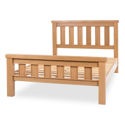 Wooden bed frame on a white background