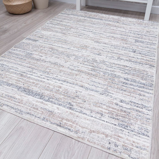 Striped area rug on a wooden floor