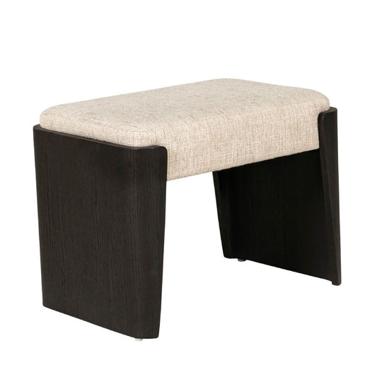 Stool with beige cushioned seat and black wooden legs on a white background