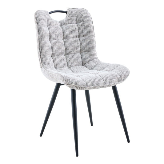 Biscuit cushioned chair with black legs on a white background