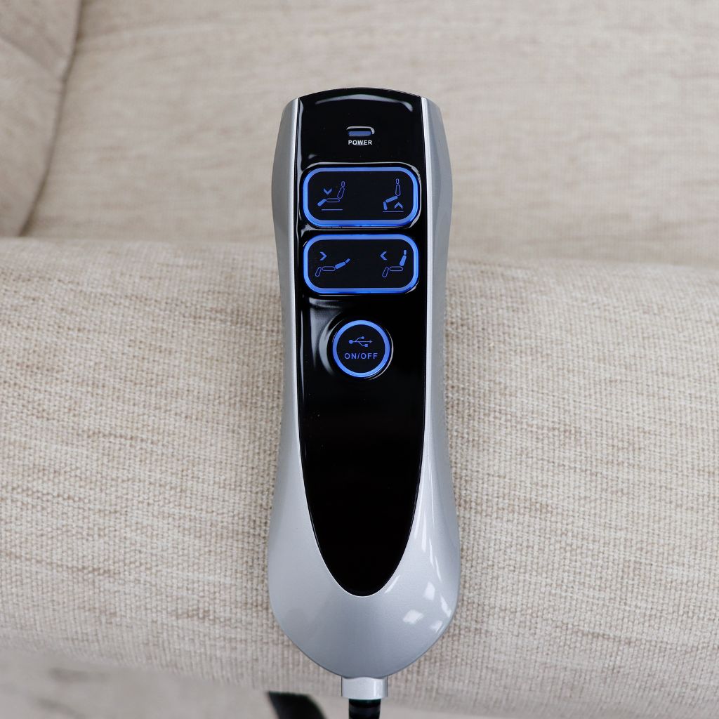Control panel with buttons on a beige sofa
