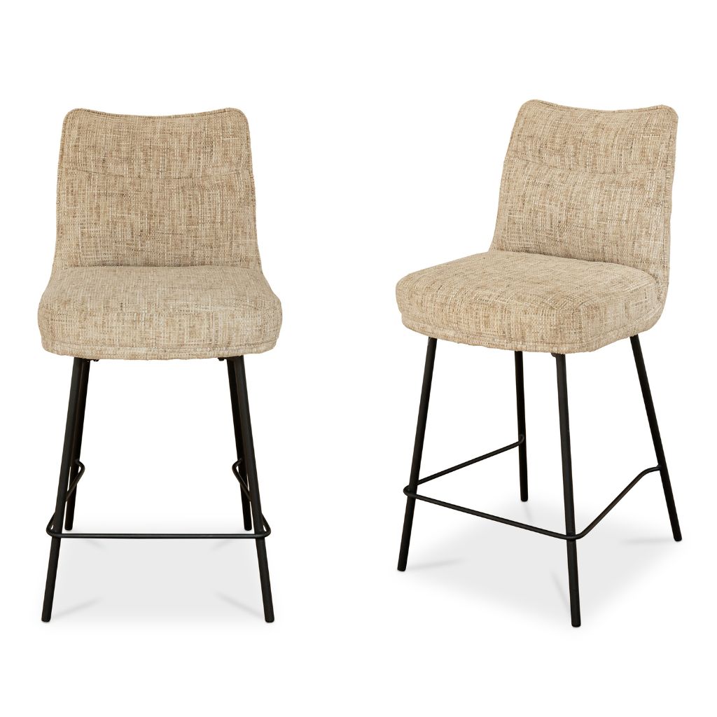 Two beige bar stools with black metal legs on a white background