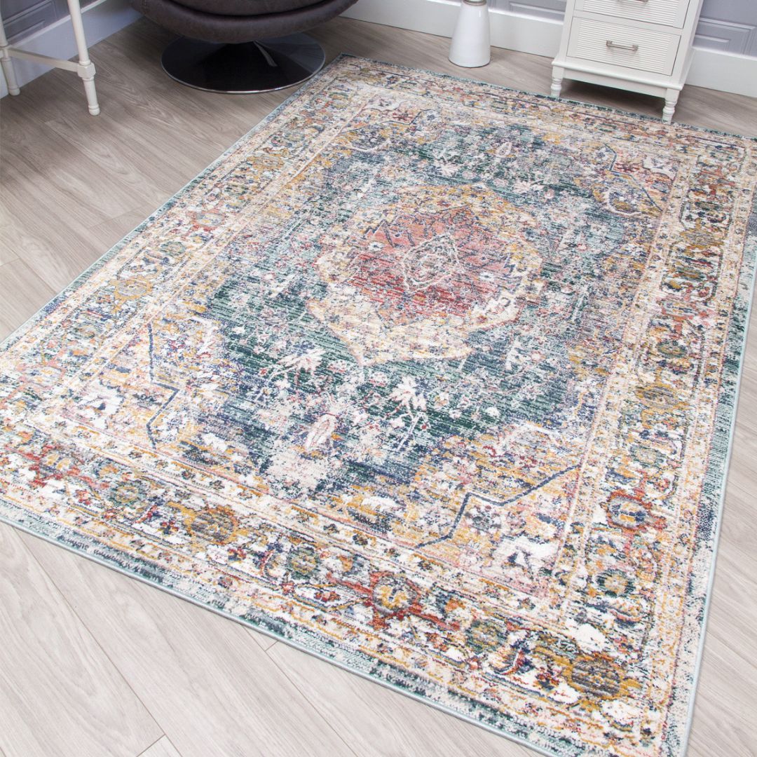 Multicolored patterned rug on a wooden floor