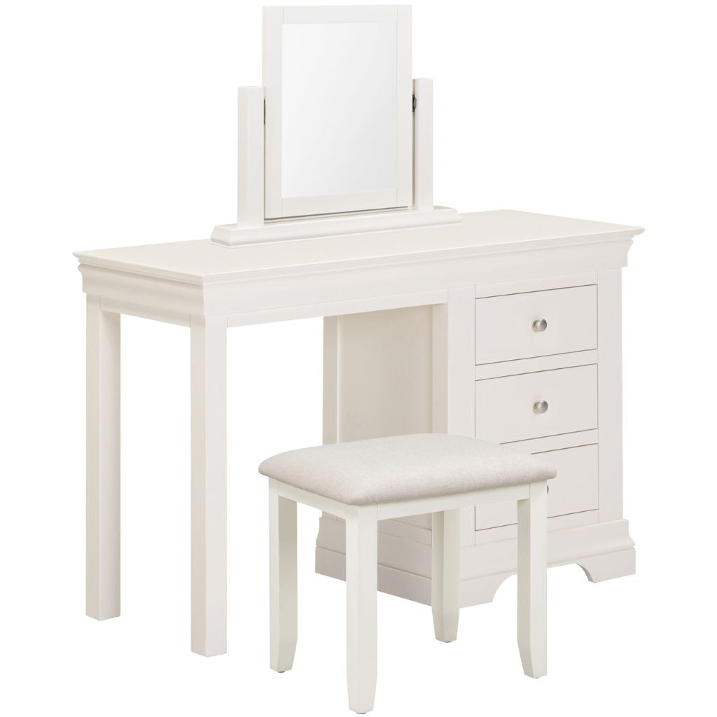 Ivory vanity table with mirror and stool on a white background