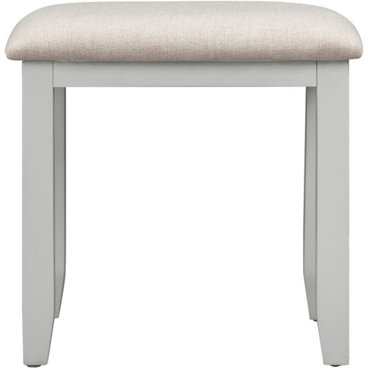 Grey stool with a beige cushioned top on a white background