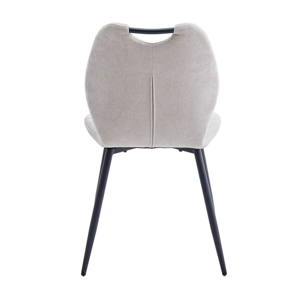 Modern chair with a beige cushioned backrest and black legs on a white background