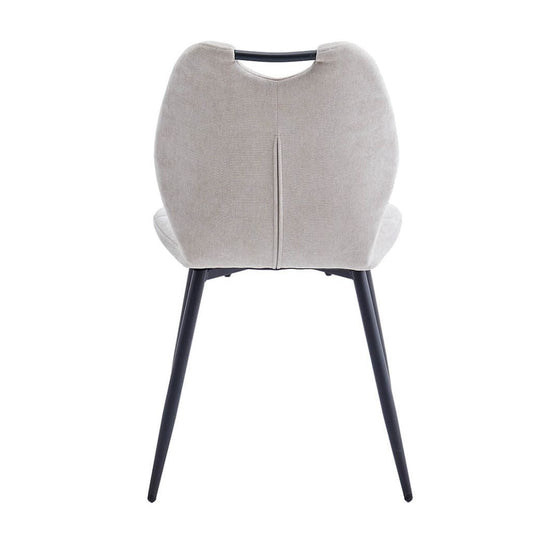 Modern chair with a beige cushioned backrest and black legs on a white background