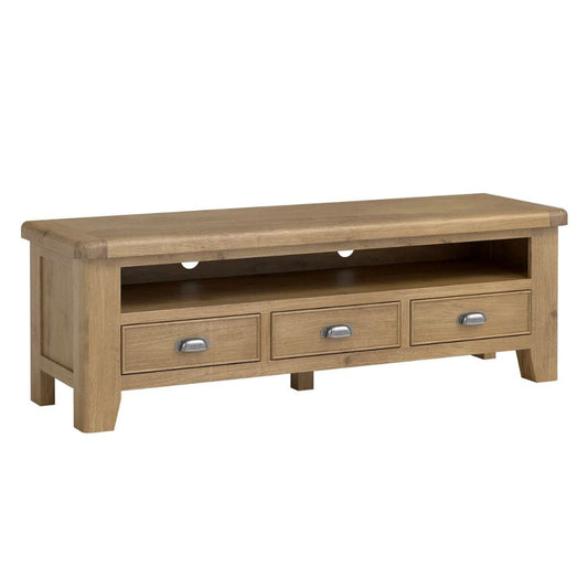 Wooden TV stand with three drawers on a white background