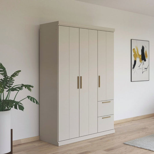 Beige wardrobe with oak handles in a room with a plant and abstract art on the wall.
