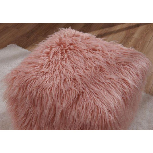 Pink fluffy stool on a wooden floor