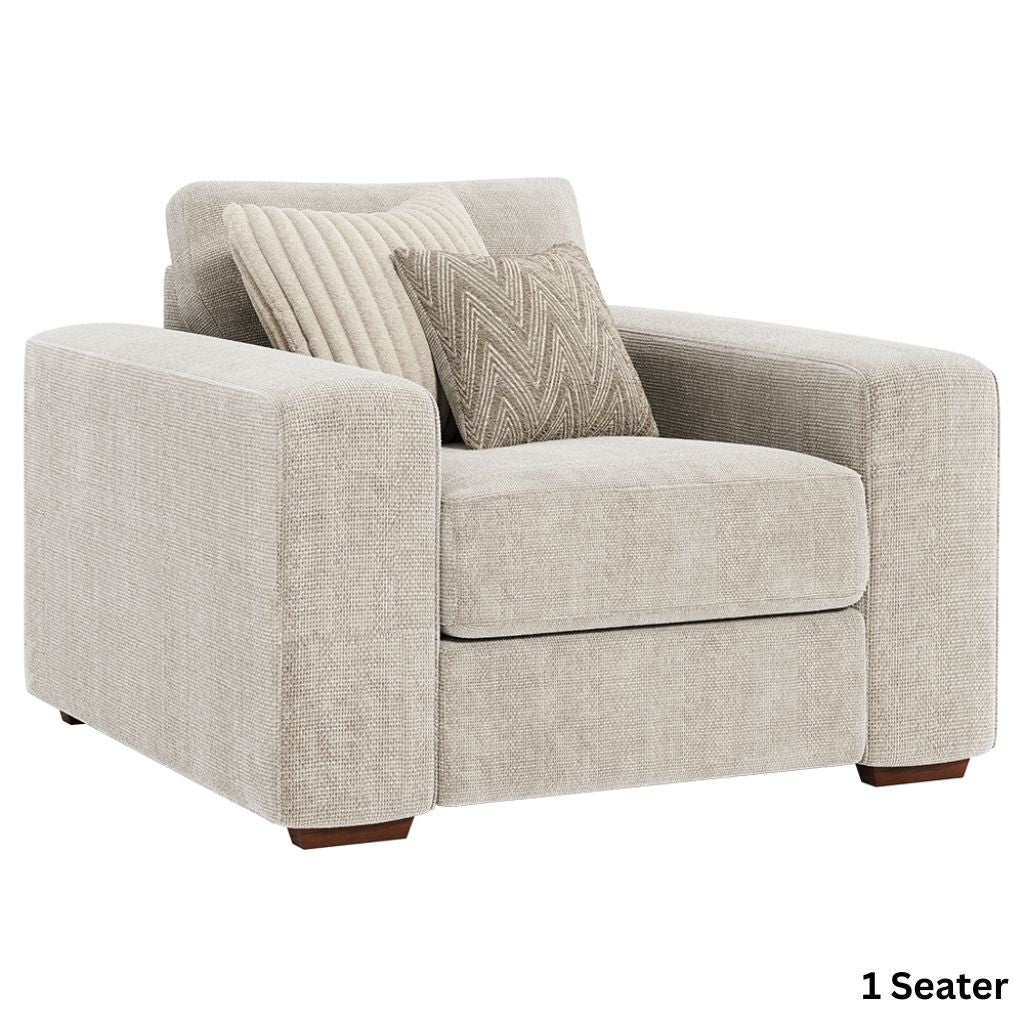 Beige armchair with patterned cushions on a white background