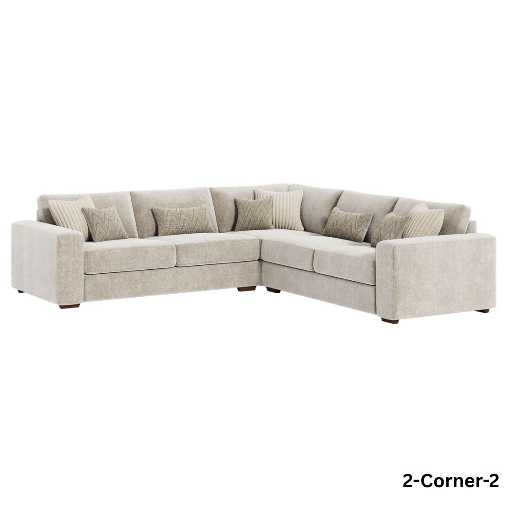 Beige sectional sofa with cushions on a white background