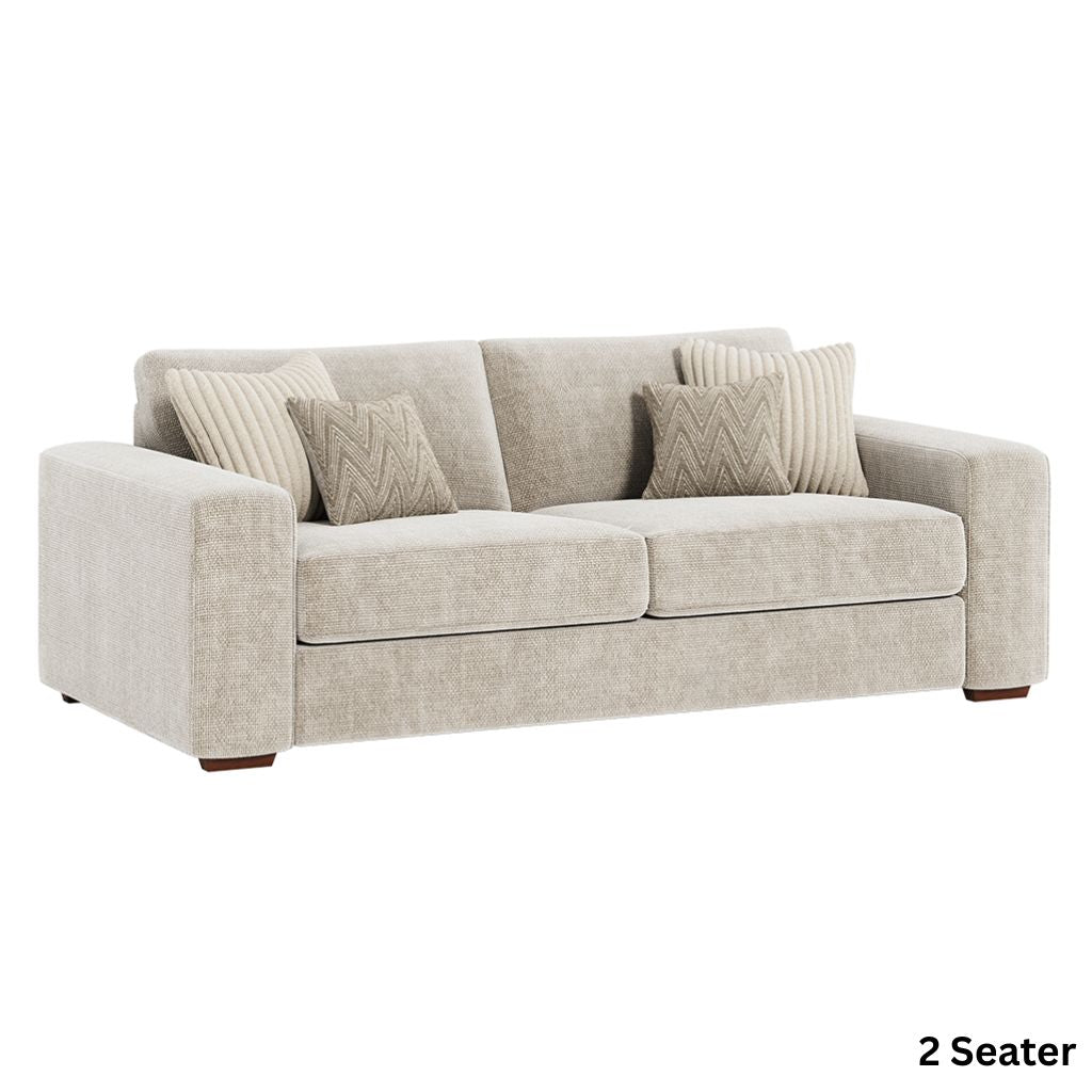 Beige sofa with patterned cushions on a white background