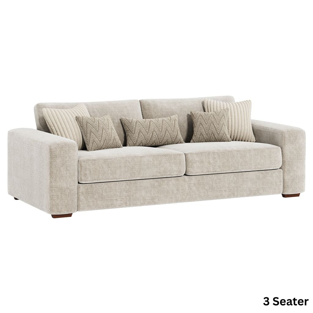 Beige sofa with patterned cushions on a white background