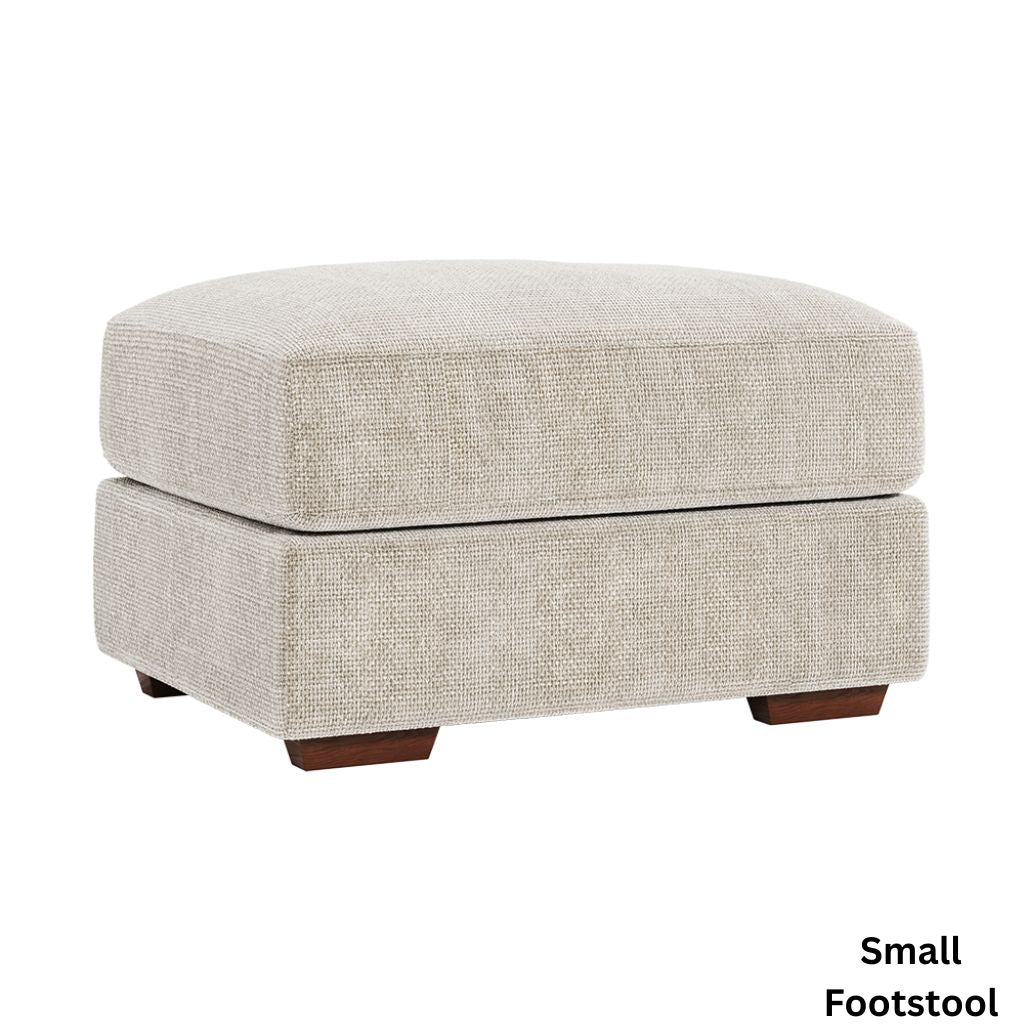 Small footstool with beige fabric and wooden legs on a white background