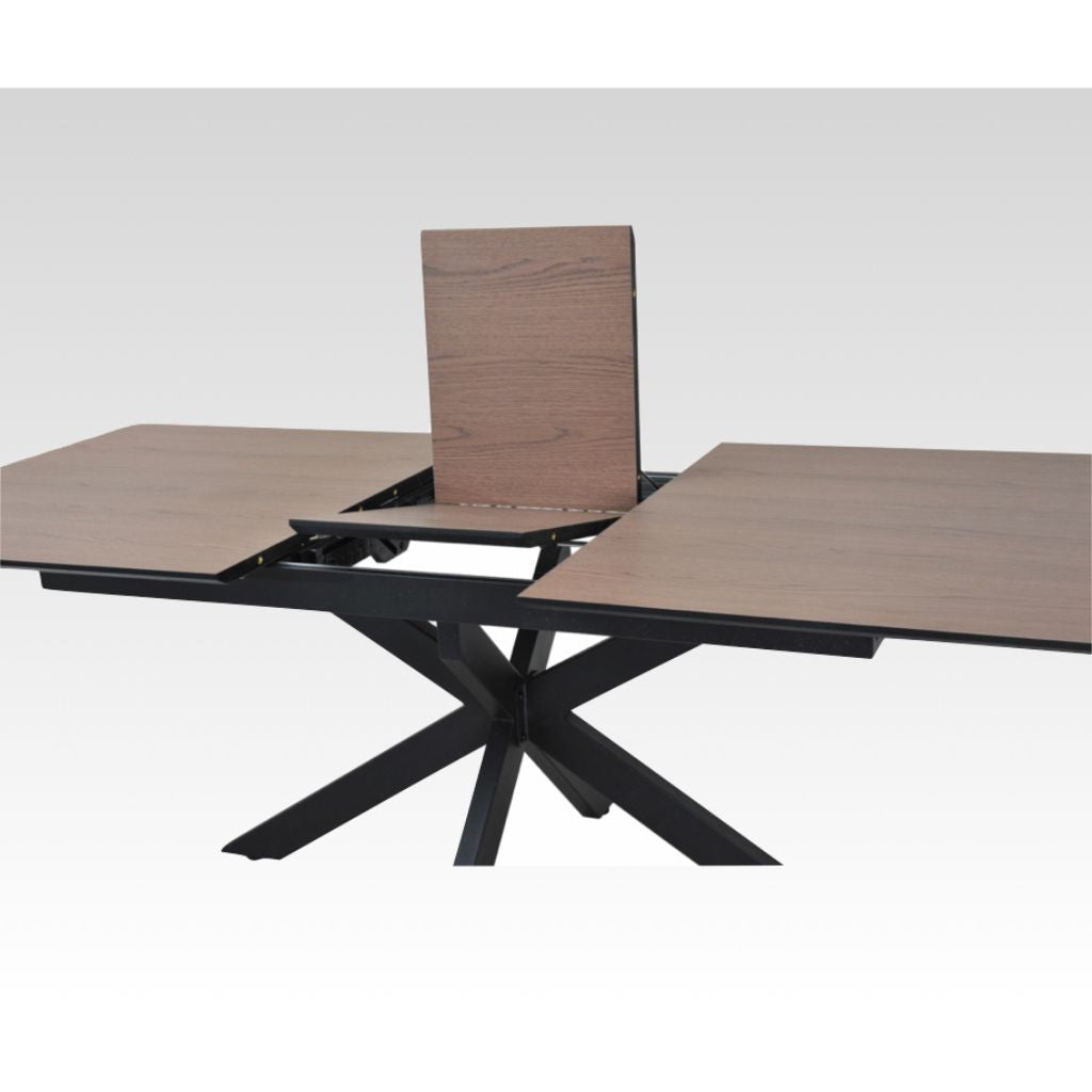 Dining table with butterfly extension on a white background