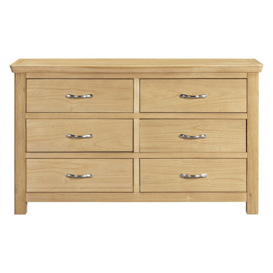 Wooden dresser with six drawers on a white background