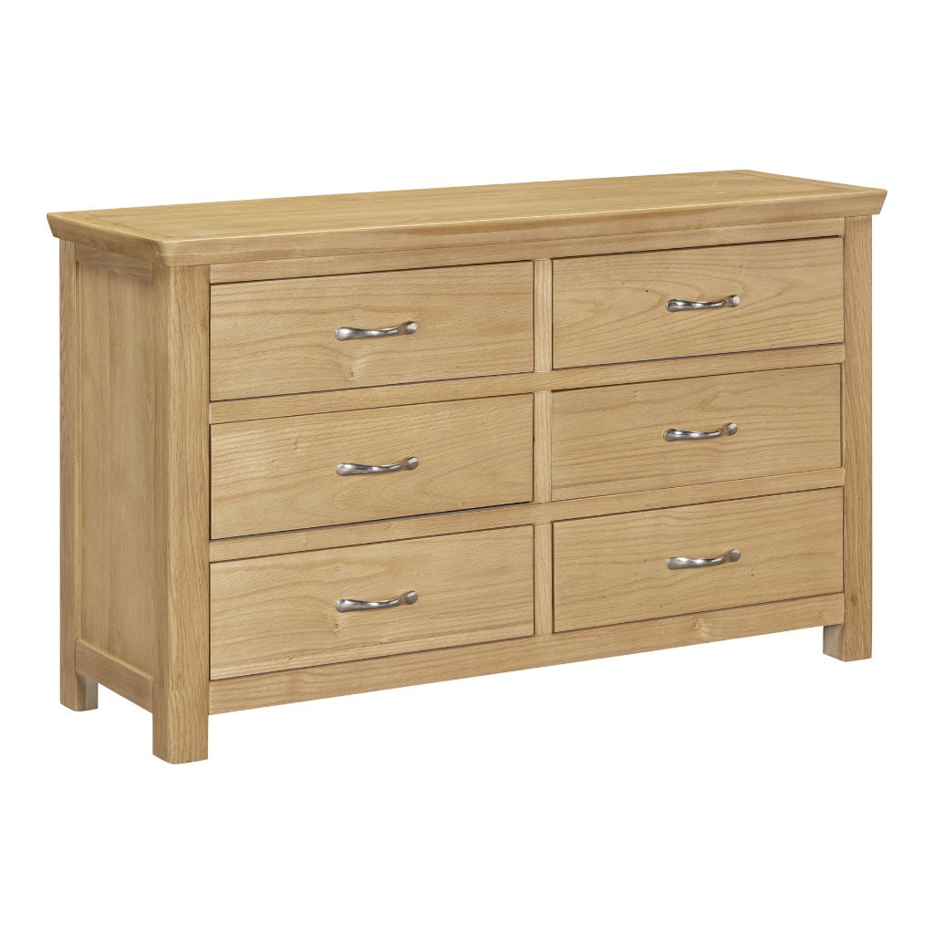 Wooden dresser with six drawers on a white background