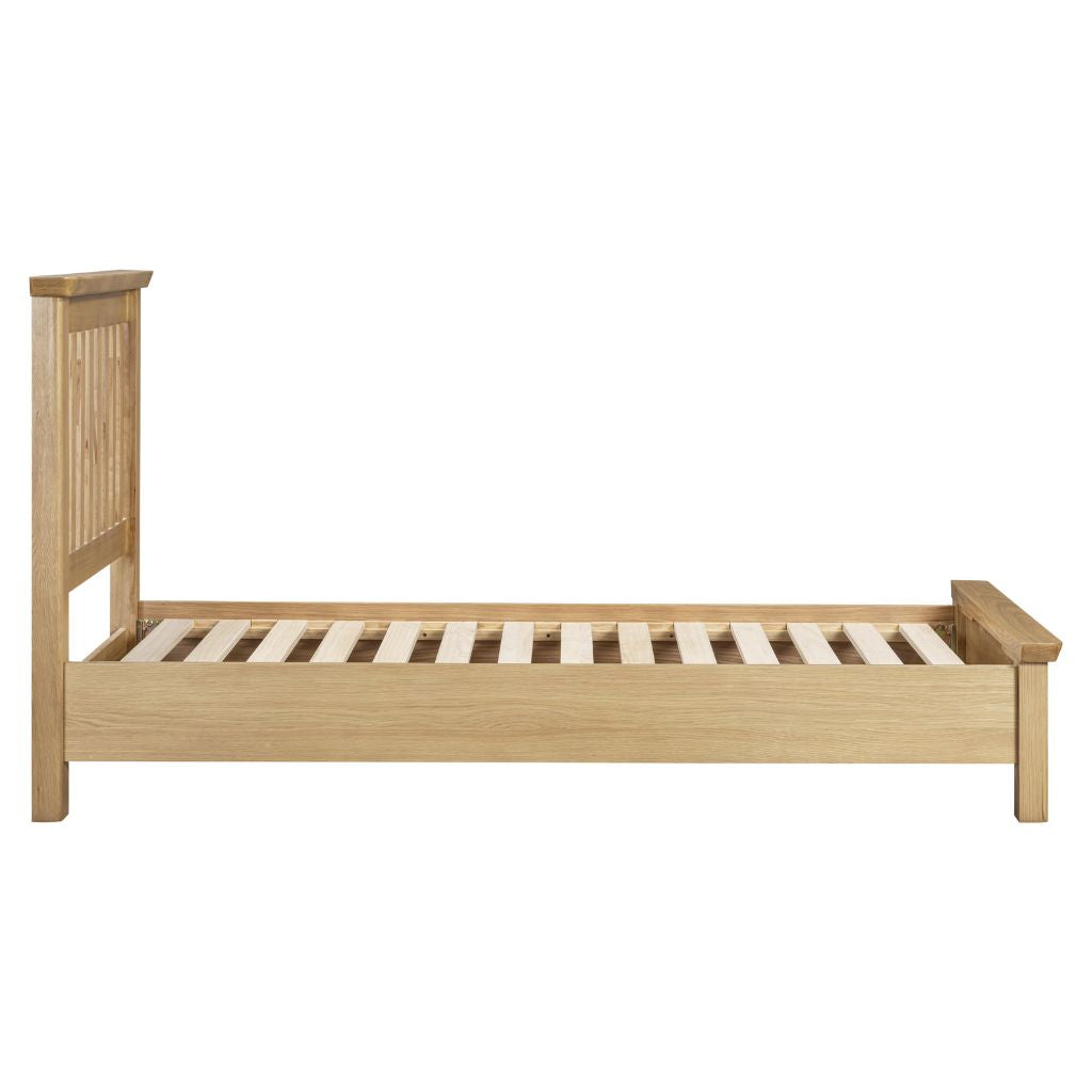 Wooden bed frame on a white background