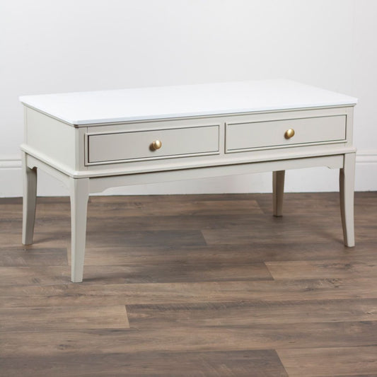 Stone coffee table with two drawers on a wooden floor