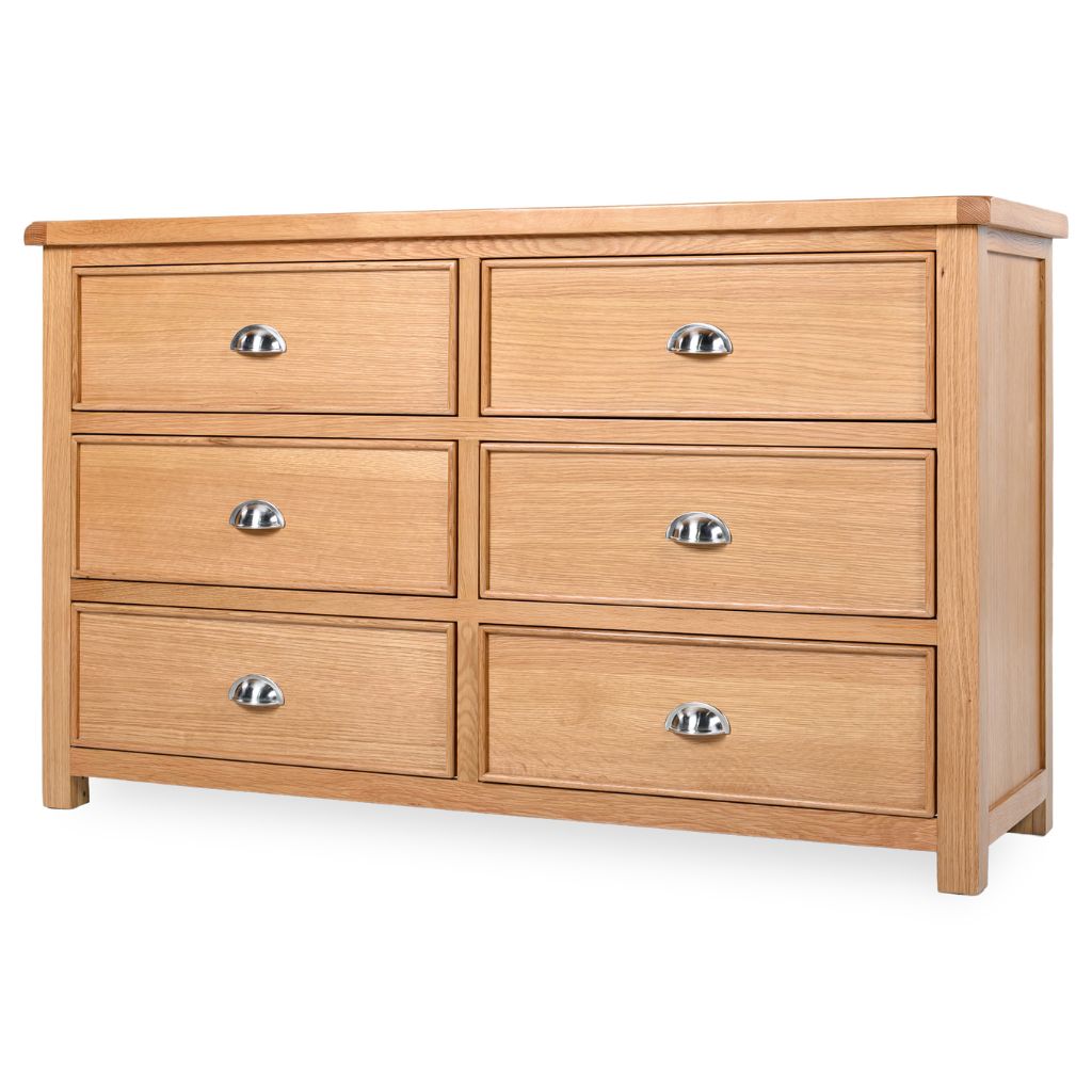 Wooden dresser with six drawers on a white background