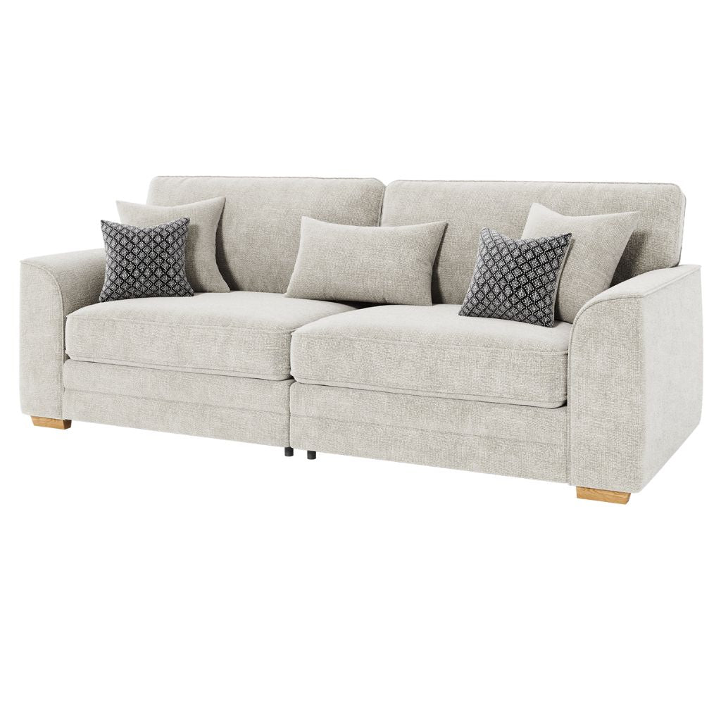 Natural sofa with patterned cushions on a white background