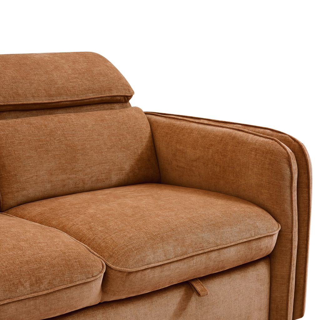 Close up view of the beautiful rust roscoe with stunning piping details and a discreet strap to convert into a bed.