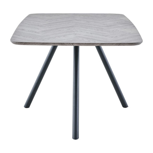 Square table with a light gray wooden top and dark legs on a white background