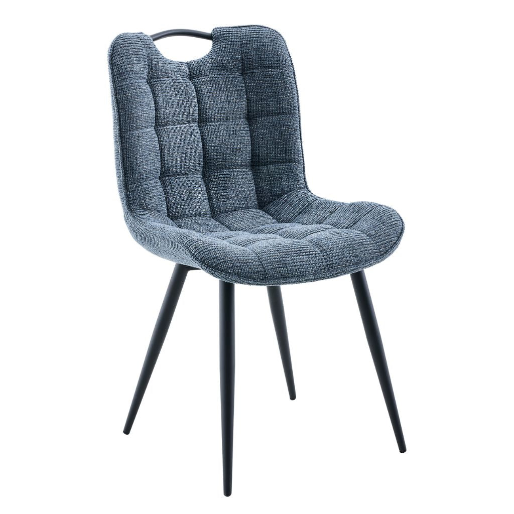 Blue upholstered chair with black legs on a white background