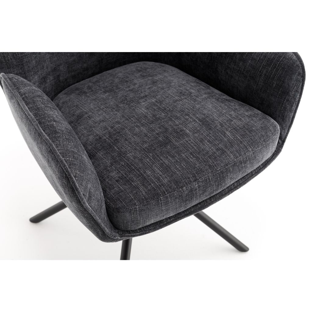 Grey upholstered chair with metal legs on a white background