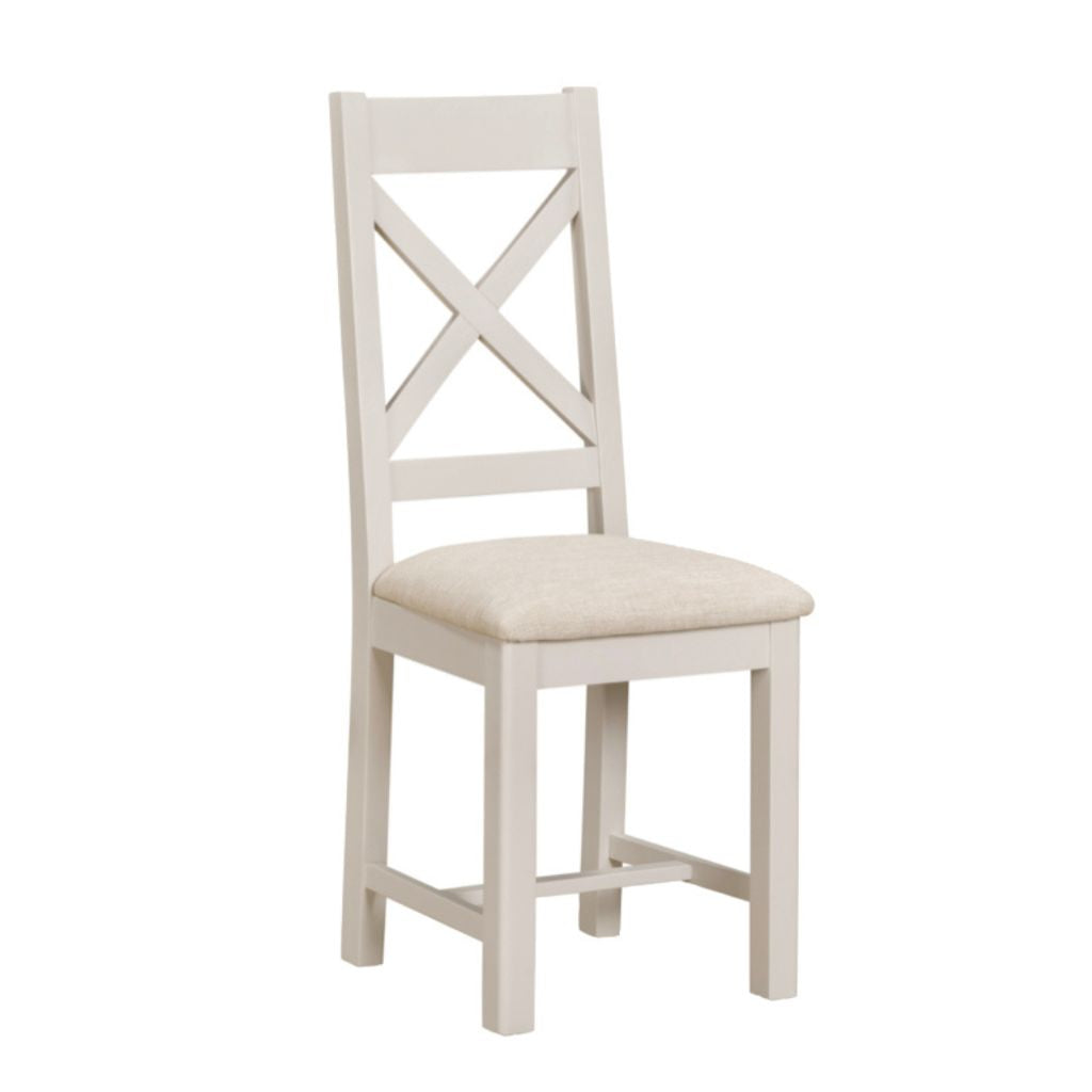 Oyster grey wooden chair with a cream cushion on a white background