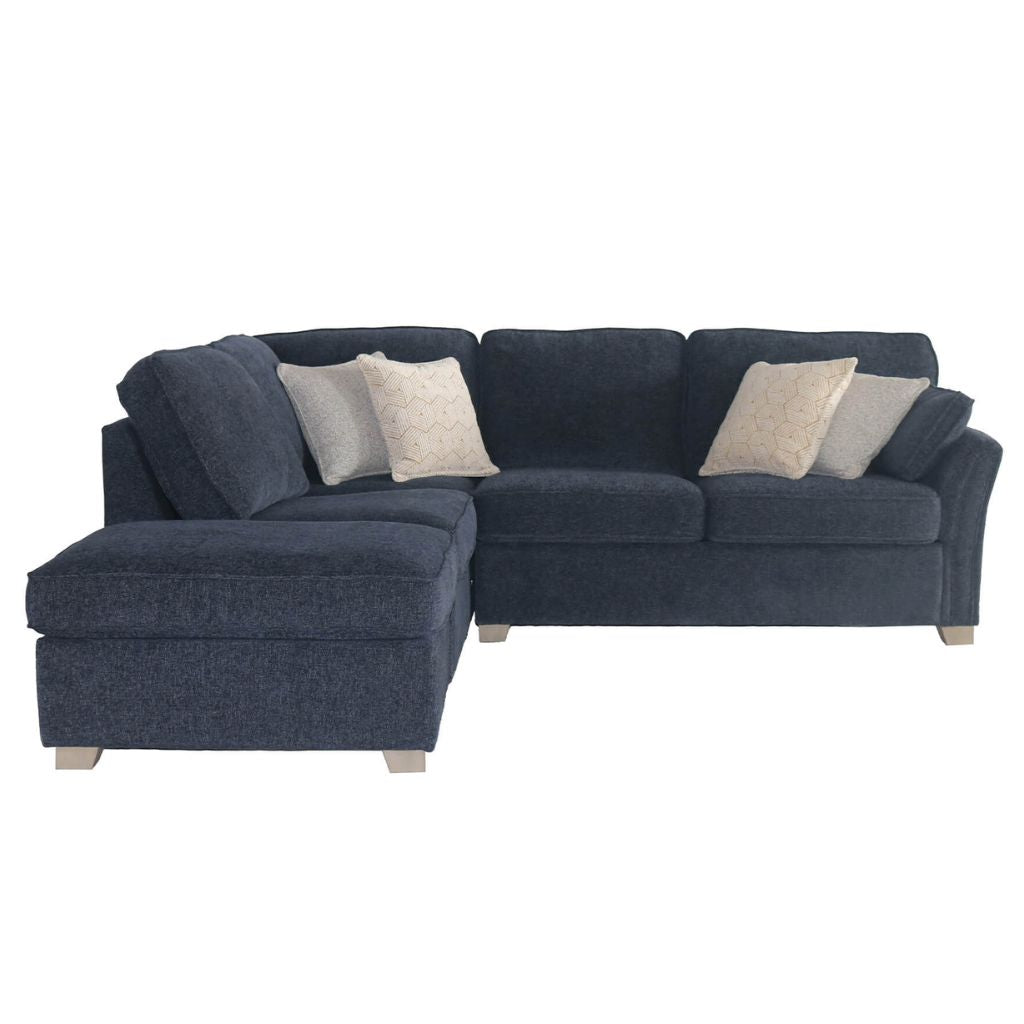 Navy blue sectional sofa with beige and gray cushions on a white background