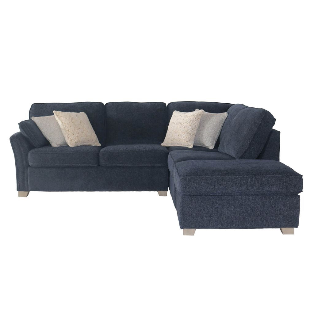 Navy blue sectional sofa with beige cushions on a white background
